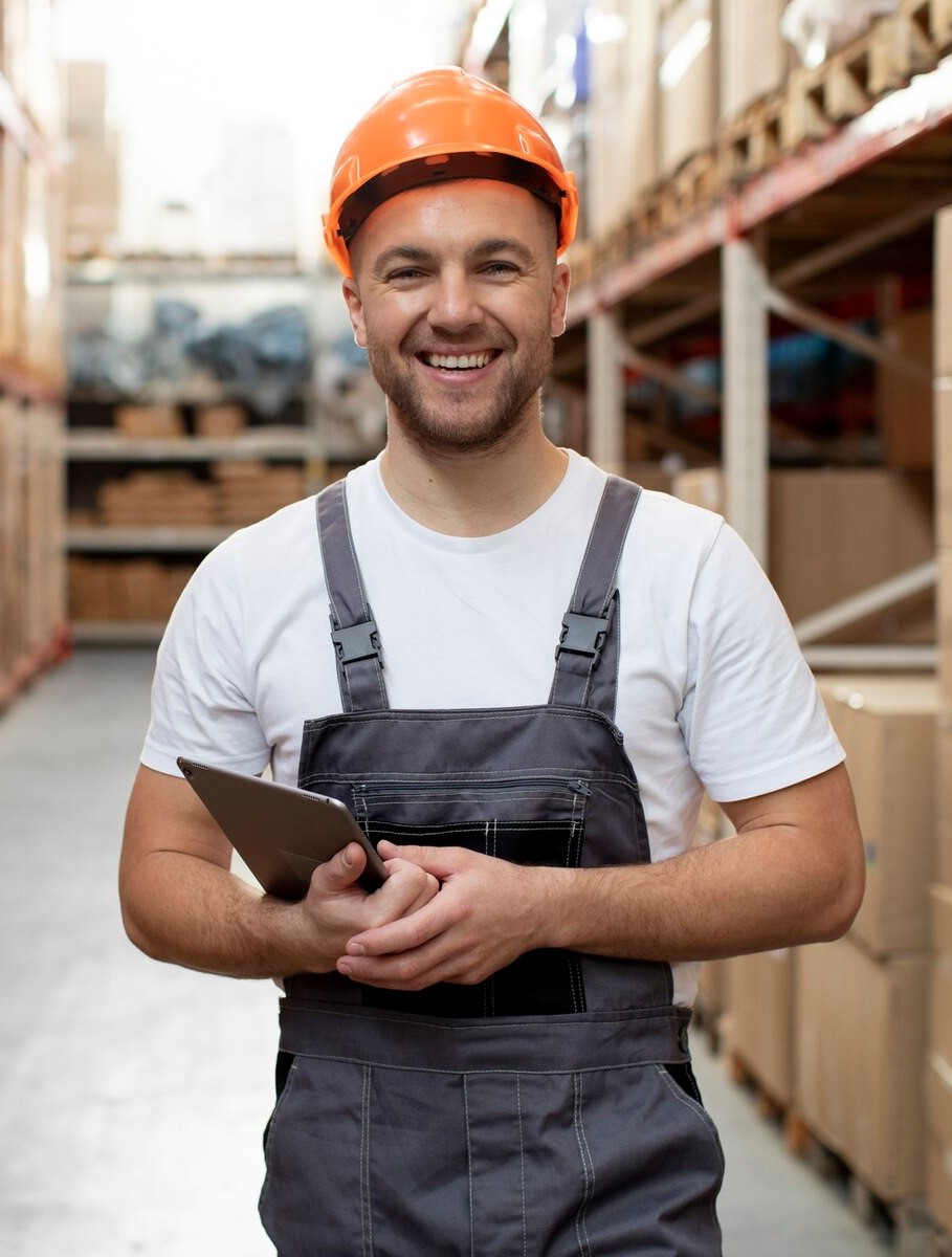 medium-shot-smiley-man-warehouse